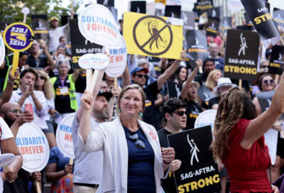 Chrissy Lynch, newly elected president of the Massachusetts AFL-CIO, rallies with striking SAG-AFTRA workers in September. (Jessica Rinaldi/The Boston Globe via Getty Images)