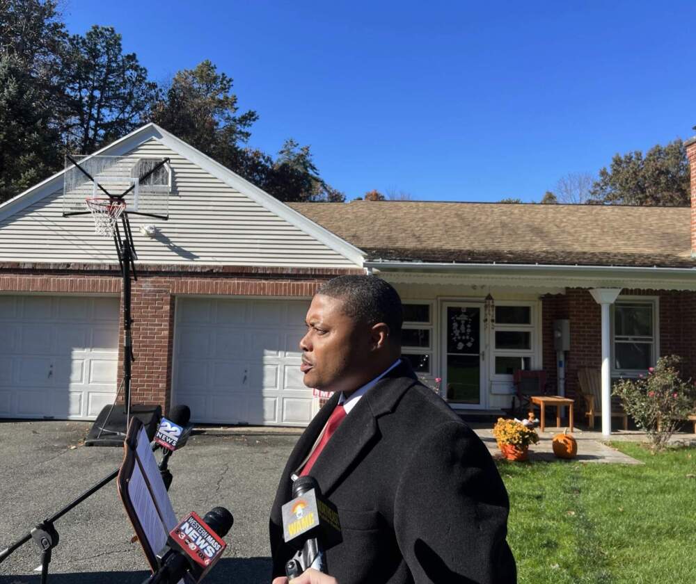 Springfield Mayoral candidate Justin Hurst at a press conference outside his home, refuting allegations that his campaign paid for votes. (Adam Frenier/NEPM)