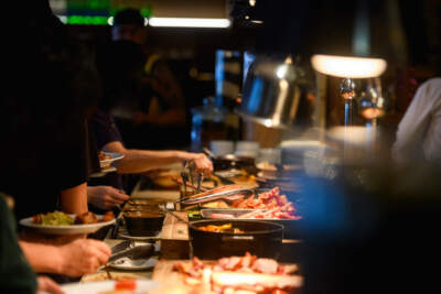Food at restaurant buffet. (webphotographeer/Getty Images)