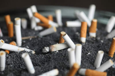 Cigarette butts in an ashtray in New York in 2019. (Jenny Kane/AP)