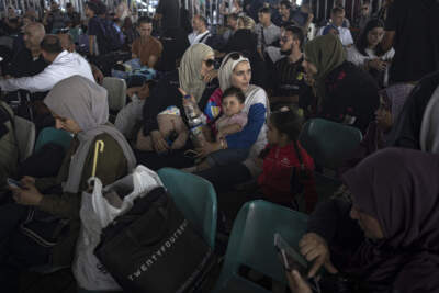 Palestinians wait to cross into Egypt at Rafah, Gaza Strip, on Nov. 1. (Fatima Shbair/AP)