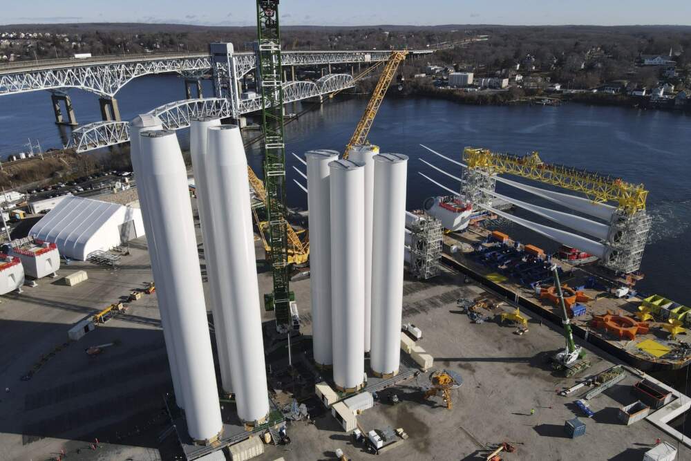While wind farm towers stand on the ground, a generator and it's blades are readied for transport to the South Fork Wind farm site at State Pier in New London, Conn., Monday, Dec. 4, 2023. (Ted Shaffrey/AP)