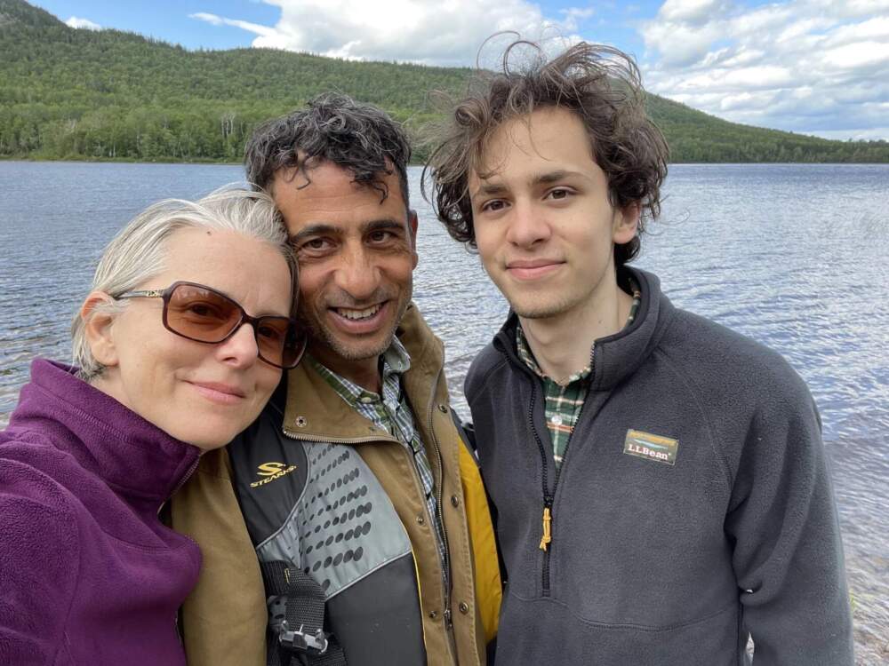 Hisham Awartani with his mother, Elizabeth Price, and father, Ali Awartani, on a trip to Maine. (Courtesy of Elizabeth Price via Vermont Public)