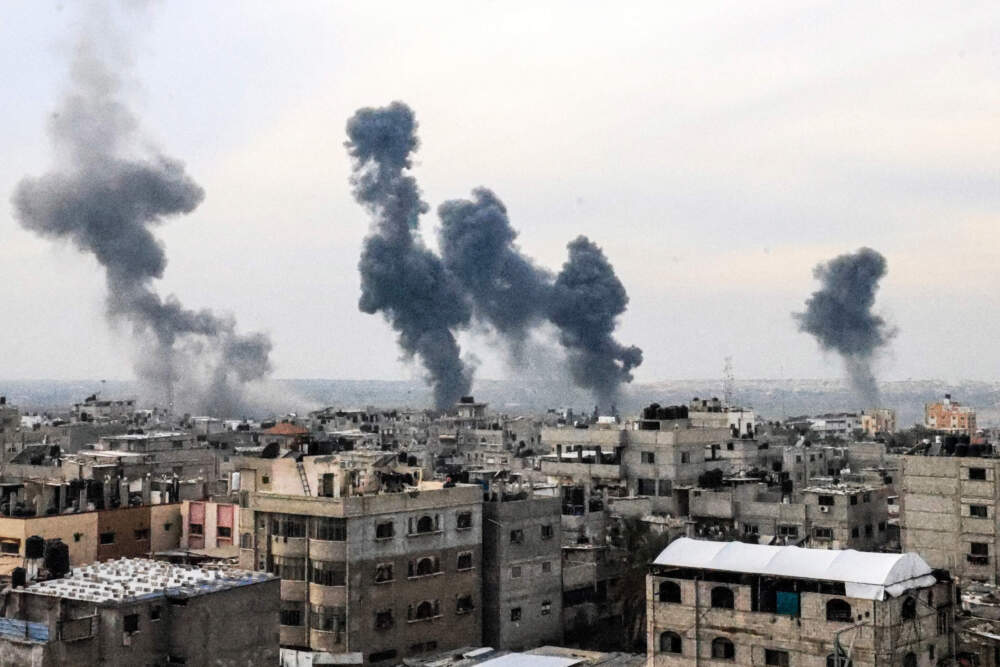 A picture taken on Dec. 20, 2023, from Rafah shows smoke billowing after Israeli strikes over the Nuseirat refugee camp in the central Gaza Strip, amid ongoing battles between Israel and the militant group Hamas. (Mahmud Hams/AFP via Getty Images)