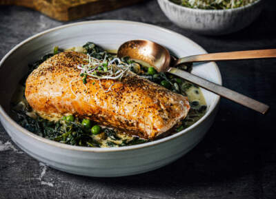 Crispy salmon with green curry spinach. (Courtesy of Nik Sharma)