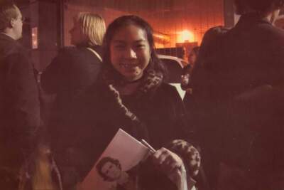 The author in 2004, outside the Wang Theater stage door in Boston, holding her concert program, waiting for Josh Groban to come out and sign autographs. (Courtesy Thuy Phan)