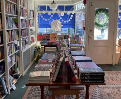 A table display of books at The Bookshop of Beverly Farms, Beverly, MA, 2023. (Courtesy Hannah Harlow)