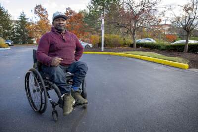 Disability rights activist Murshid Buwembo has spoken out about the need for better wheelchair warranty laws. (Robin Lubbock/WBUR)