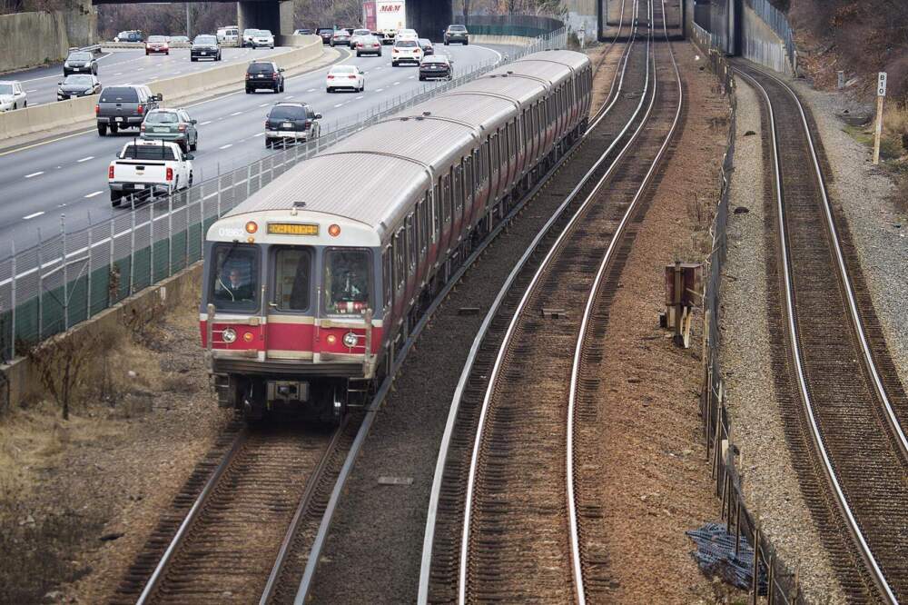 An MBTA Red Line train barrels down the tracks on its way to Braintree Station. (Jesse Costa/WBUR)