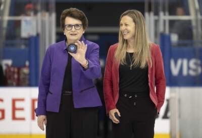 Billie Jean King and Jayna Hefford walk to centre ice for the ceremonial puck drop before Toronto plays New York in their PWHL hockey game at the Mattamy Athletic Centre in Toronto. (Photo by Mark Blinch/Getty Images)