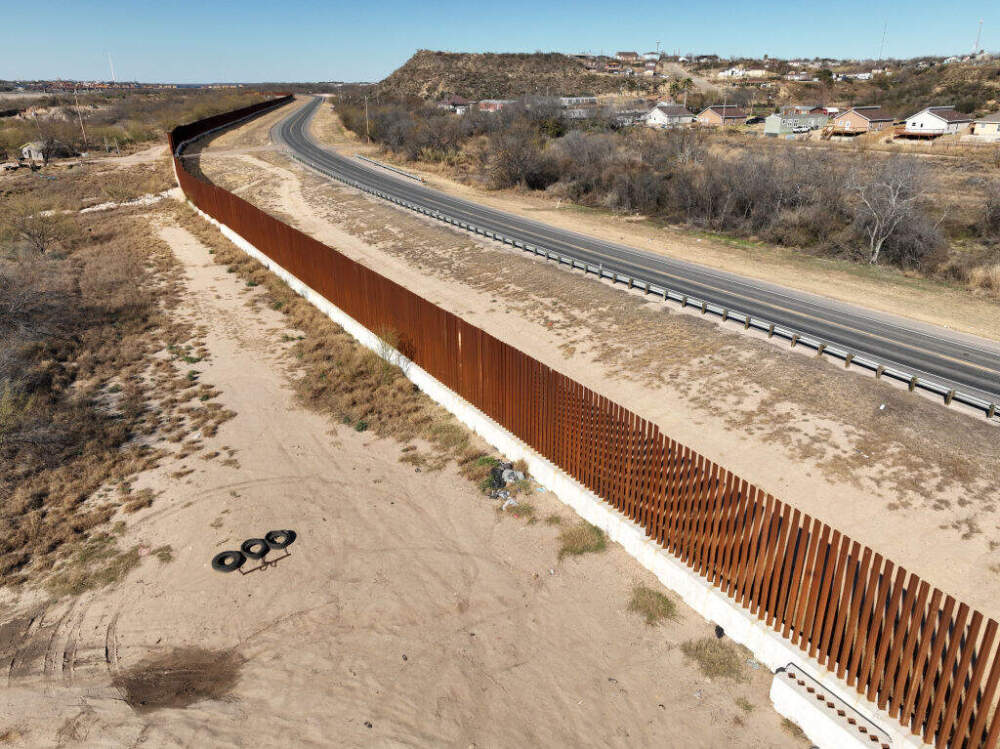 An aerial view of the area as migrants walking along razor wire after crossing the Rio Grande into the United States on January 28, 2024 in Eagle Pass, Texas. (Photo by Lokman Vural Elibol/Anadolu via Getty Images)