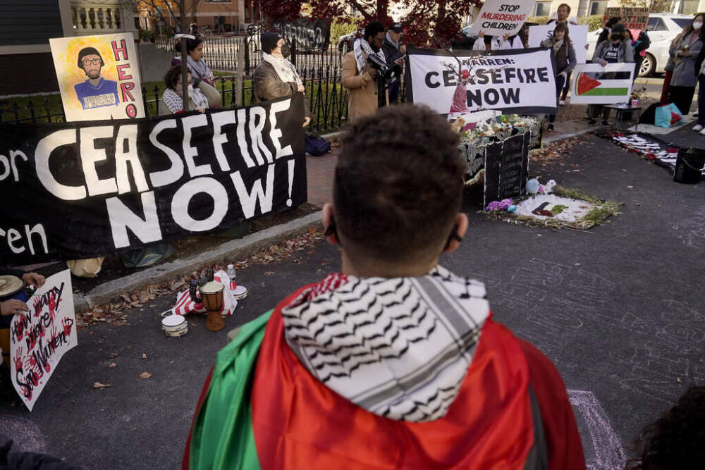 Pro-Palestinian demonstrators call for a ceasefire in Gaza during a protest outside the home of U.S. Sen. Elizabeth Warren last November in Cambridge. (Steven Senne/AP)