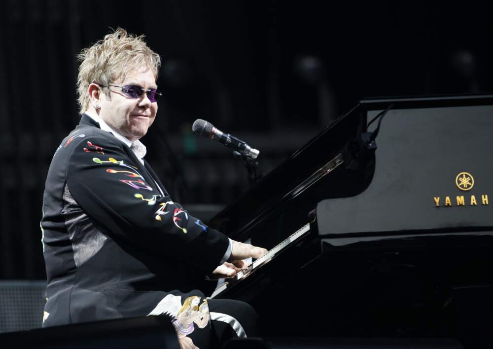 Elton John performs during a concert with Billy Joel. (Michael Dwyer/AP)