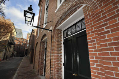 A gaslight shines outside a doorway to the African Meeting House in Boston. (Josh Reynolds/AP)