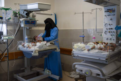 A nurse prepares premature babies for transport to Egypt after they were evacuated from Shifa Hospital in Gaza City to a hospital in Rafah, Gaza Strip, Monday, Nov. 20, 2023. (Fatima Shbair/AP)