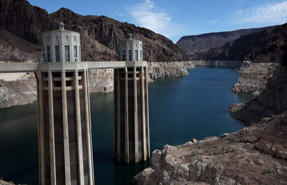 Water intake towers at the Hoover Dam stands next to a bleached &quot;bathtub ring&quot; on the banks of Lake Mead on Aug. 19, 2022 in Lake Mead National Recreation Area, Arizona. (Justin Sullivan/Getty Images)