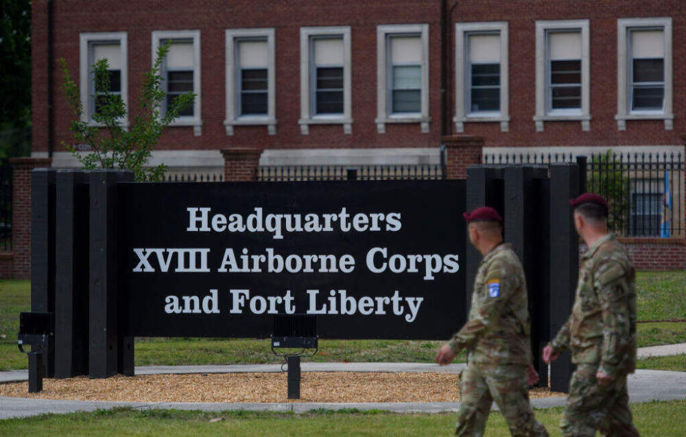 FORT BRAGG, NORTH CAROLINA - JUNE 2: Soldiers walk passed a newly unveiled sign after a redesignation ceremony officially renaming the military installation Fort Liberty on June 2, 2023 in Fayetteville, North Carolina. Fort Liberty, formerly known as Fort Bragg, is the largest military installation by population in the United States.  (Photo by Melissa Sue Gerrits/Getty Images)