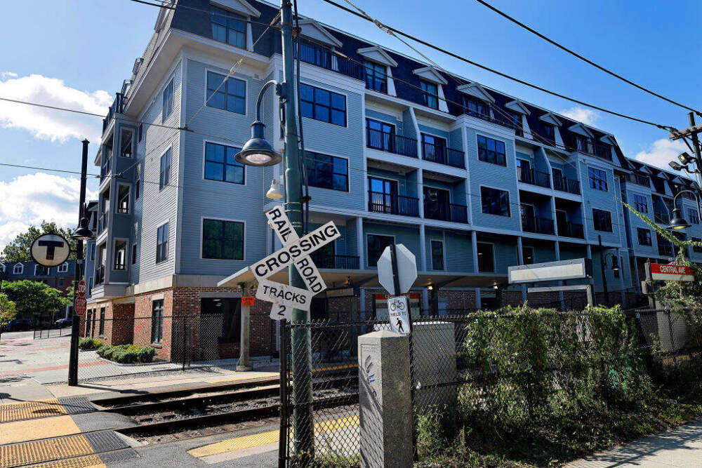 Adjacent the Mattapan Trolley stop at Central Station, a luxury condo development is an example of multifamily housing that Milton has previously allowed. (Lane Turner/The Boston Globe via Getty Images)