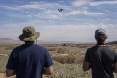 Tim Wallace, left, and Phinehas Lampman use drones to study how coccidioidomycosis, or valley fever, travels through the air. (Carolyn Van Houten/The Washington Post via Getty Images)