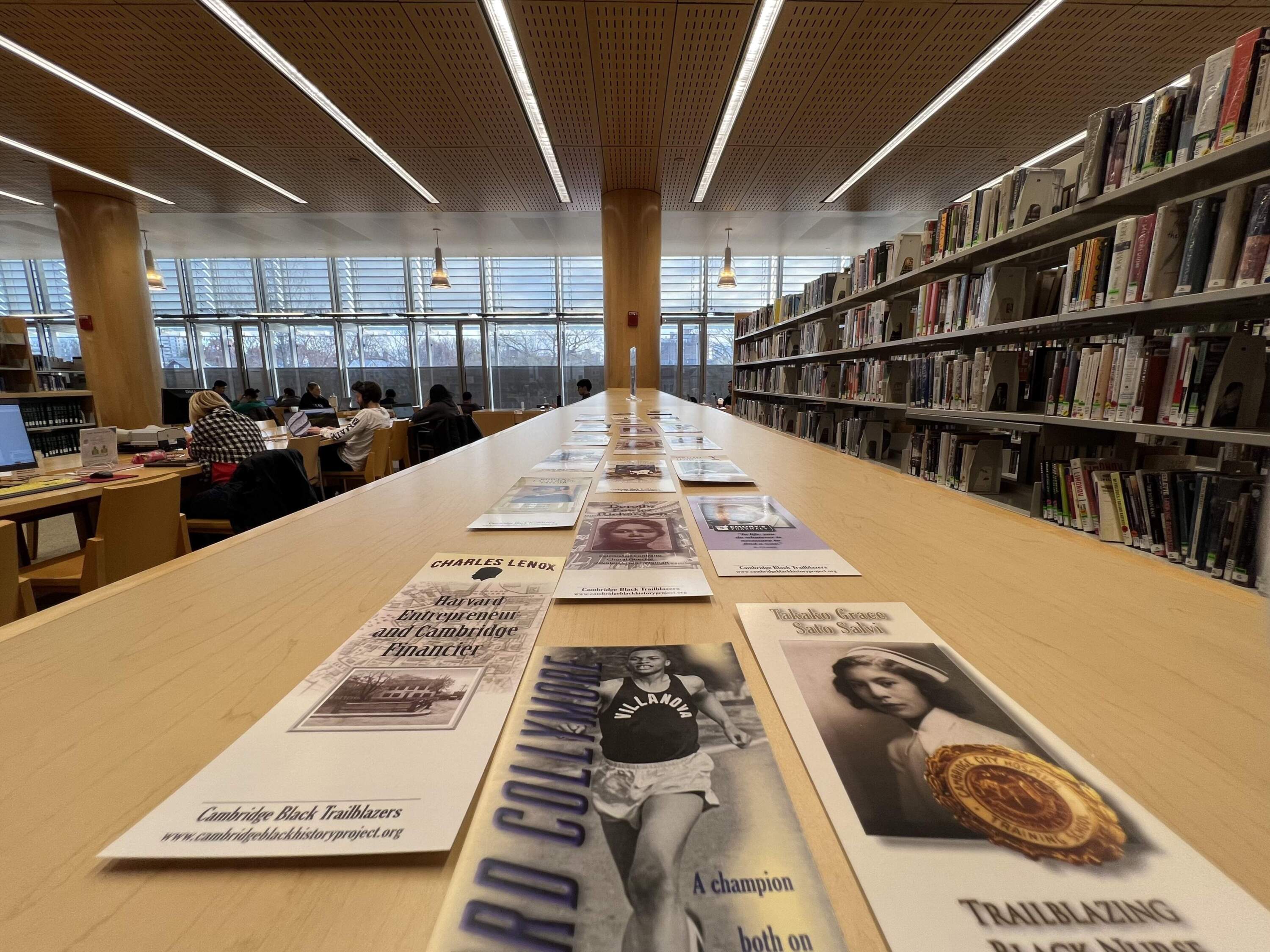 The Cambridge Black History Project's bookmarks at the Cambridge Public Library. (Solon Kelleher/WBUR)