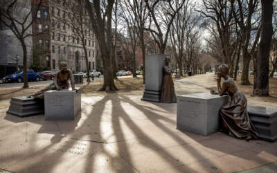 The Boston Women's Memorial on the Commonwealth Avenue Mall with statues of Lucy Stone, Abigail Adams and Phillis Wheatley. (Robin Lubbock/WBUR)