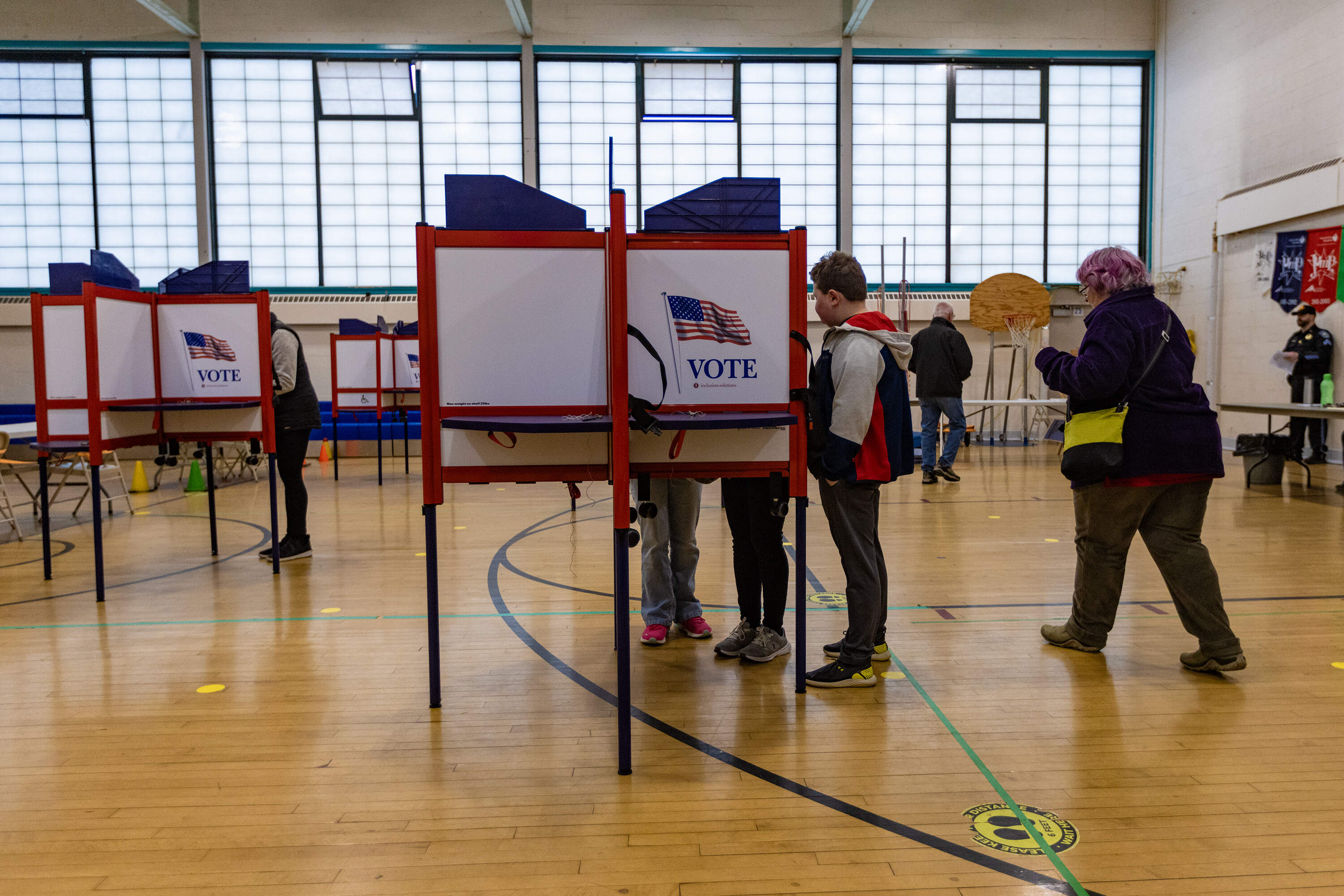 Voters at Ashby Elementary School. (Jesse Costa/WBUR)