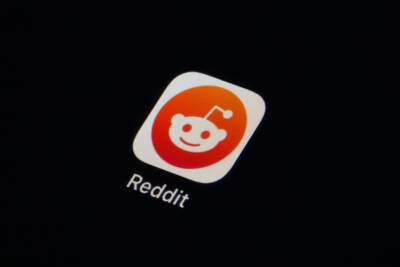 The Reddit app icon is seen on a smartphone. (Matt Slocum/AP)