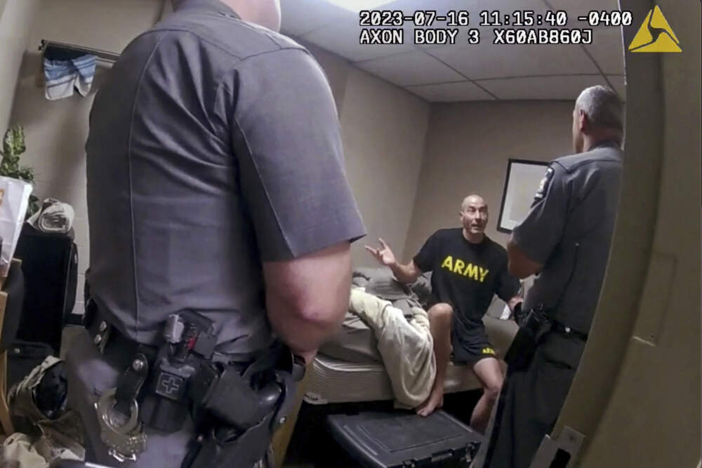 An image taken from New York State Police body camera video that was obtained by WMTW-TV 8 in Portland, Maine. New York State police interview Army Reservist Robert Card, the man responsible for Maine's deadliest mass shooting, at Camp Smith in Cortlandt, New York on July 16, 2023. (WMTW-TV 8/New York State police via AP)