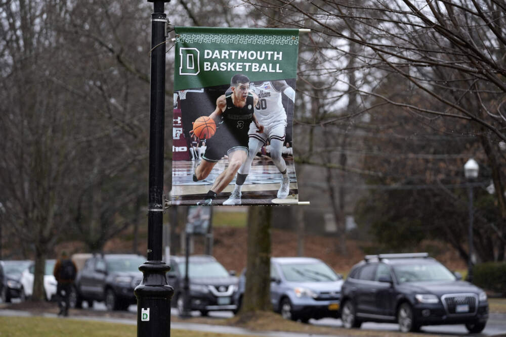 A poster of a basketball player is attached to a lamppost on the campus of Dartmouth College, Tuesday, March 5, 2024, in Hanover, N.H. (Robert F. Bukaty/AP)