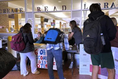 Brattleboro Union High School students register to vote during a voter drive at the school, Feb. 14, 2024, in Brattleboro, Vt. (Lisa Rathke/AP)