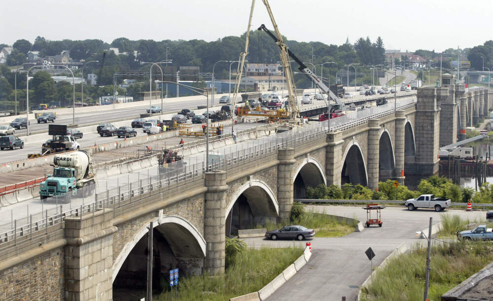Construction crews work on the eastbound lanes of the Washington Bridge in Providence, R.I., in 2007. (Stew Milne/AP)