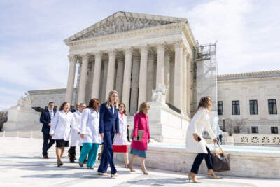 Erin Hawley, (in blue) an attorney representing the Alliance for Hippocratic Medicine, leaves the Supreme Court following oral arguments in the case of the U.S. Food and Drug Administration v. Alliance for Hippocratic Medicine on March 26. (Anna Rose Layden/Getty Images)