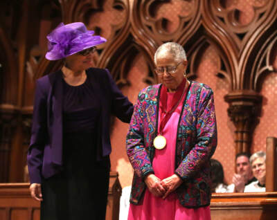 Deb Washington, left, presents Sarah-Ann Shaw with The Open Door Award on Phillis Wheatley Sunday at Old Boston's South Church in 2016. (Pat Greenhouse/The Boston Globe via Getty Images)