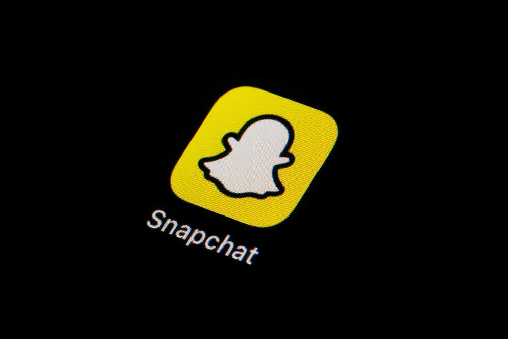 The icon for Snapchat is seen on a smartphone. (Matt Slocum/AP)