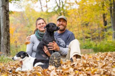Craftsbury couple Leigh and Chris Falzone, pictured here with dogs Luna and Nebi, are planning to get married in Vermont on the day of the total solar eclipse. (Toph Downey via Vermont Public)