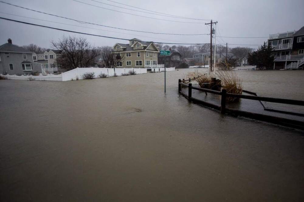 Flooding on the corner of Jericho and Otis Roads shortly after high tide in Scituate during a nor'easter 2018. (Jesse Costa/WBUR)