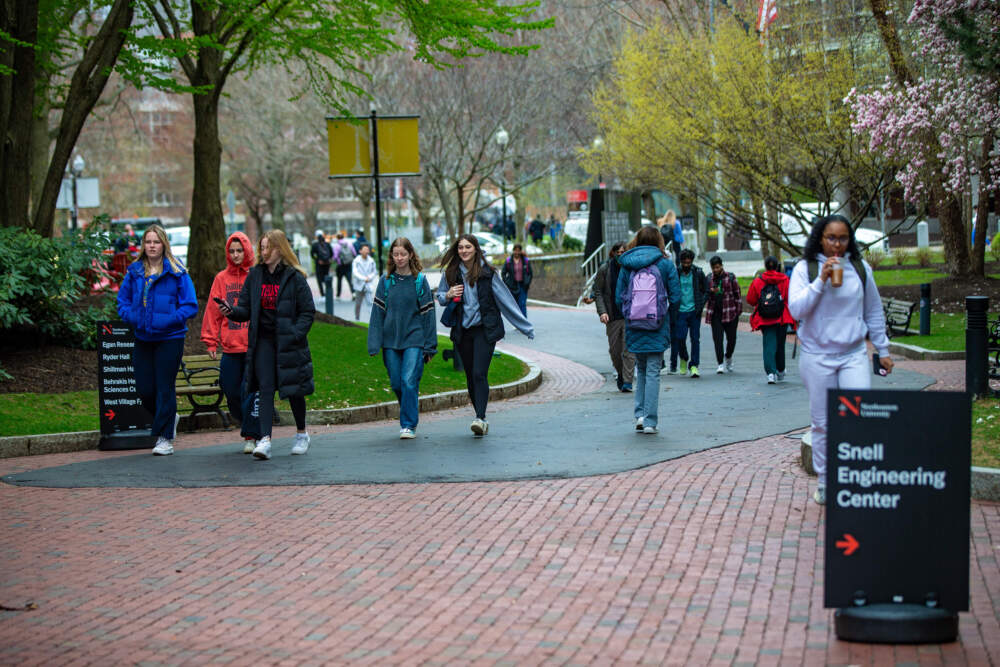 Students walk through Northeastern University's campus. (Jesse Costa/WBUR)