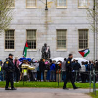 Harvard students prop up tents to protest war in Gaza and suspension
of campus group