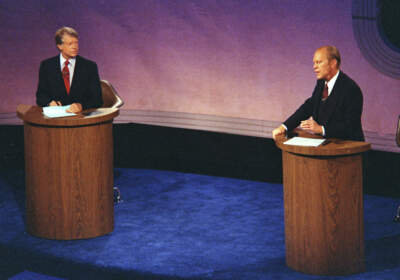 President Gerald Ford, right, speaks as Jimmy Carter listens during the first of three televised debates on Sept. 23, 1976, in Philadelphia. (AP)