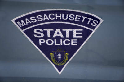 The seal of the Commonwealth of Massachusetts is displayed on a Massachusetts State Police cruiser in Boston. (Charles Krupa/AP)The seal of the Commonwealth of Massachusetts is displayed on a Massachusetts State Police cruiser in Boston. (Charles Krupa/AP)
