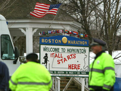 A sign on the Hopkinton Common marks the town as the Boston Marathon's official starting point. (Suzanne Kreiter/The Boston Globe via Getty Images)