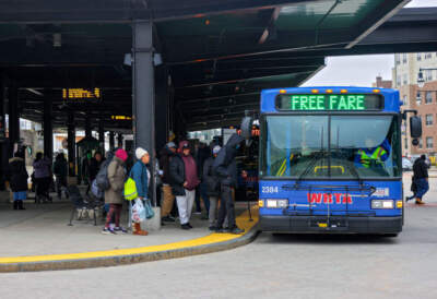 Passengers board a free fare WRTA bus at Union Station in Worcester. (Matthew J. Lee/The Boston Globe via Getty Images)