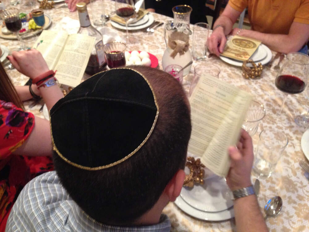 A family takes part in a Passover Seder meal. (Getty Images)