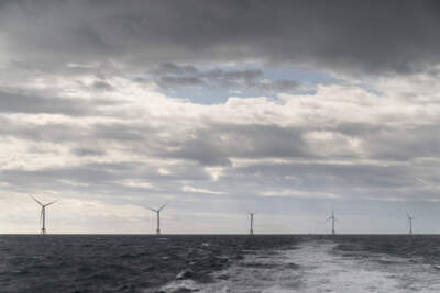 The turbines of America's first offshore wind farm are seen from a tour boat off the coast of Block Island, R.I., Oct. 17, 2022. (David Goldman/AP)