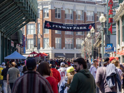 Lansdowne Street filled with fans Tuesday, as the Red Sox sold out their 2024 home opener. (Max Larkin/WBUR)