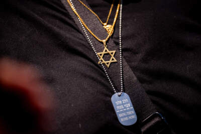 A woman wears the Star of David and another necklace that reads &quot;Bring Them Home Now!&quot; during a rally against campus antisemitism at George Washington University on May 2, 2024 in Washington, DC. (Andrew Harnik/Getty Images)