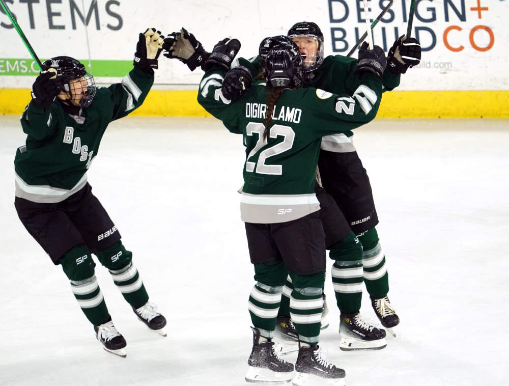 PWHL Boston Jessica Digirolamo and Kaleigh Fratkin celebrate after Fratkin scored late during the third period to defeat Montreal 4-3 in regulation. (Barry Chin/The Boston Globe via Getty Images)