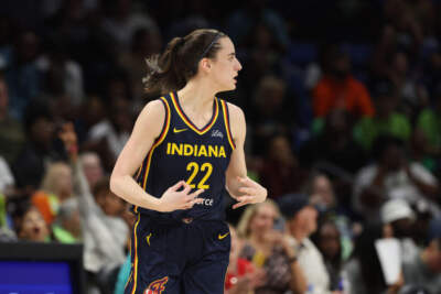 Caitlin Clark #22 of the Indiana Fever reacts after a second half three point basket against the Dallas Wings during a pre season game at College Park Center on May 03, 2024 in Arlington, Texas.  (Photo by Gregory Shamus/Getty Images)