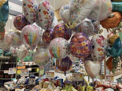 Balloons float at  Publix grocery store in Florida. (Catherine Welch/Here & Now)