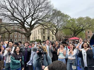 Brown University students react after a deal was reached with administrators to disband the encampment on April 30, 2024. (Olivia Ebertz/The Public's Radio)